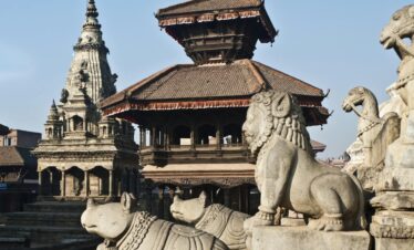 Ancient temples and stone sculptures in Bhaktapur, capturing Nepal's rich cultural heritage.